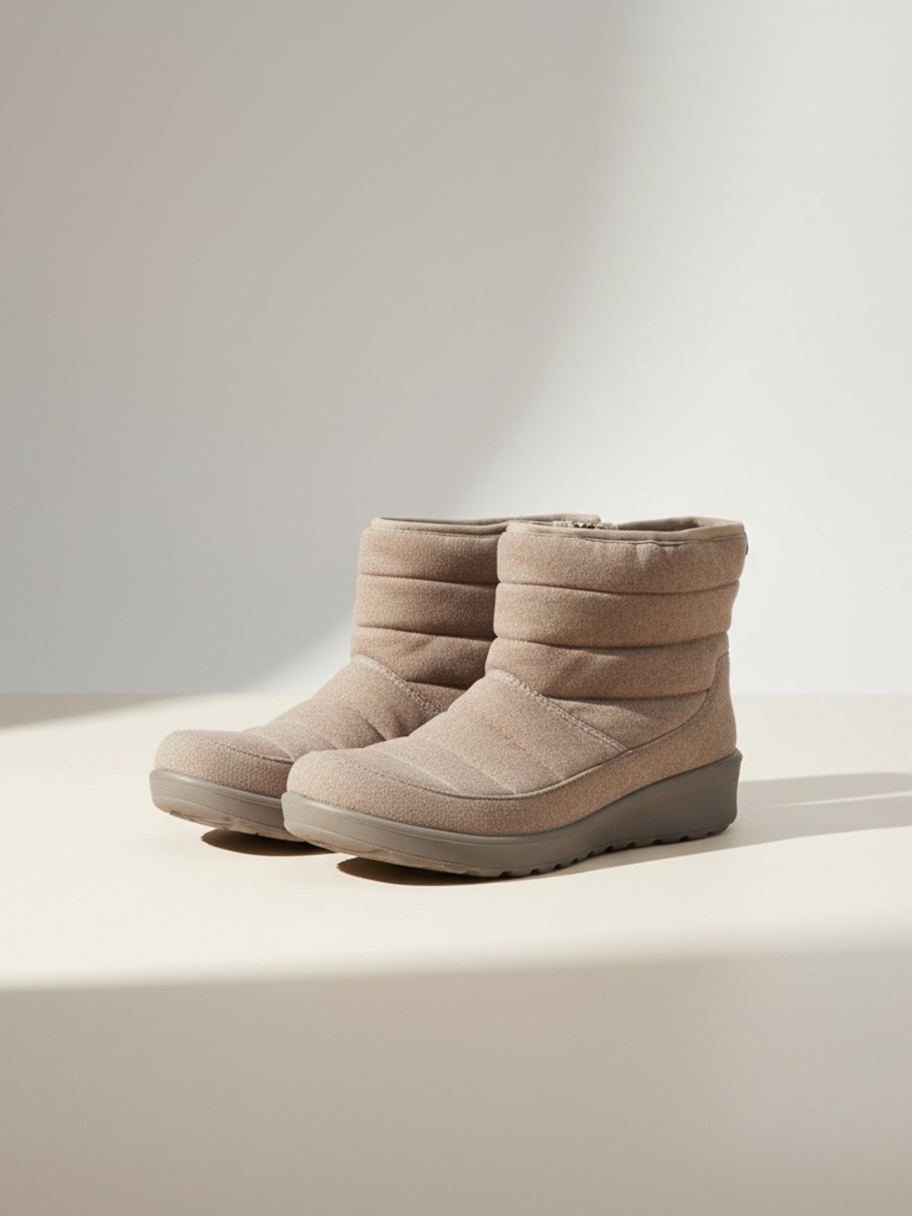 Bzees Women's Quilted Ankle Bootie in Taupe